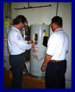 Instructor and students training on equipment, mid-2000s