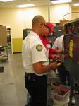 Instructor guiding a student in the QTC lab, early 2010s